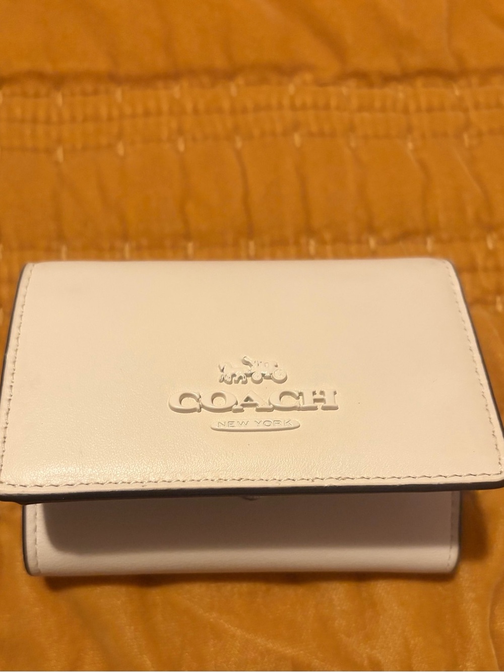Coach White Leather Compact Wallet with Embossed Logo